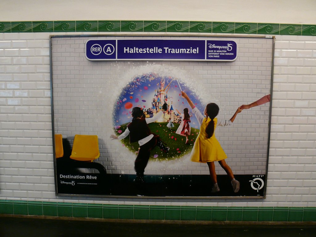 Deutschsprachige Werbung fr die RER Linie A in der Pariser Metro: Die Linie fhrt zur  Haltestelle Traumziel  (zur  Destination Rve ). Klar ist unten zu sehen, was damit gemeint ist: Disneyland. 

Paris Metro 2007