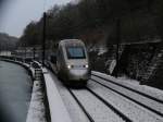 Vogesenwinter am Rhin-Marne-Canal.
Ein SNCF TGV-POS  fhrt als Zug TGV9217 von Paris ber Straburg nach Zrich.
10.01.2010 Arzviller