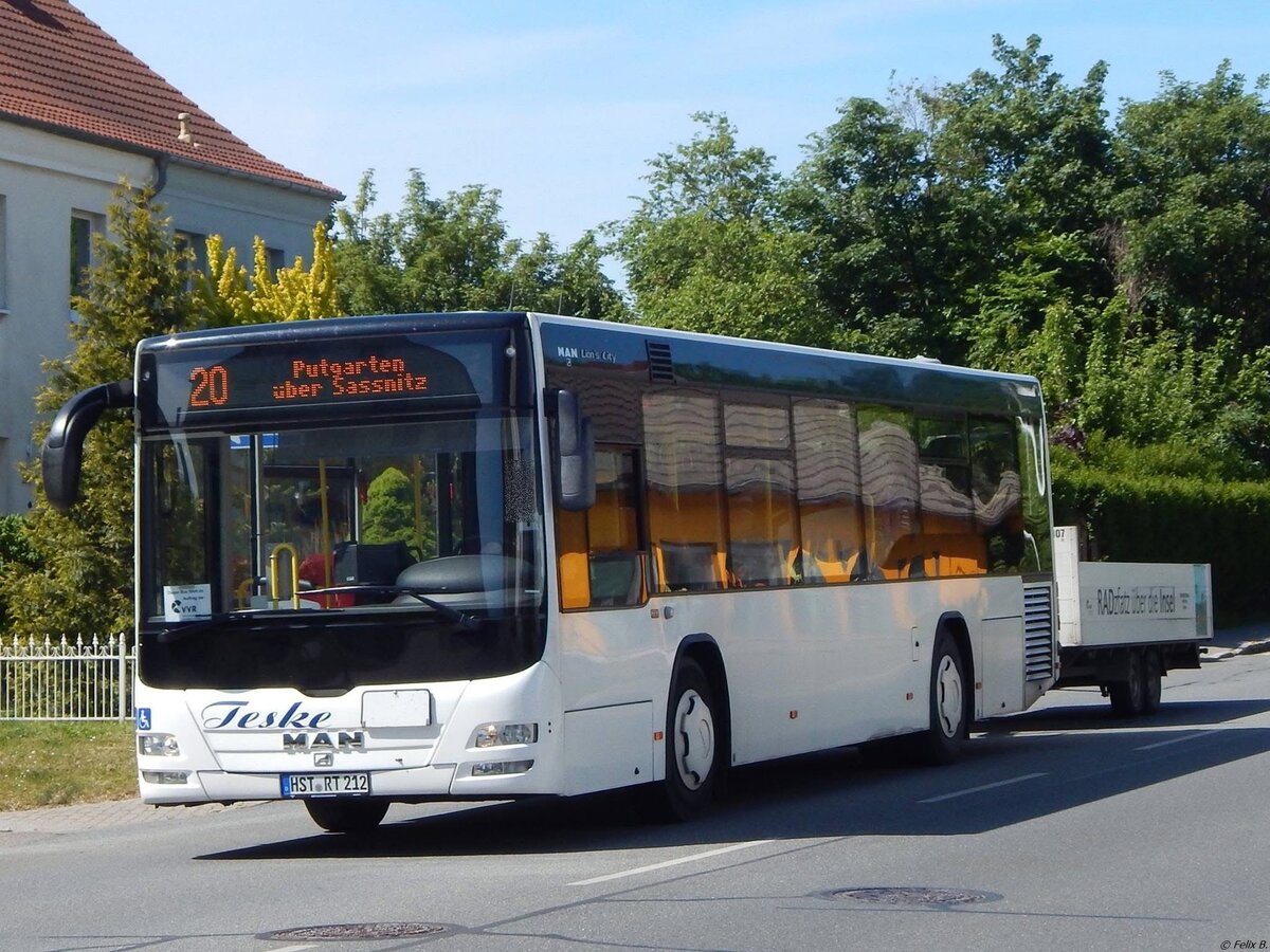 MAN Lion's City LE Ü vom Reiseienst Teske aus Deutschland mit Anhänger in Sassnitz.
