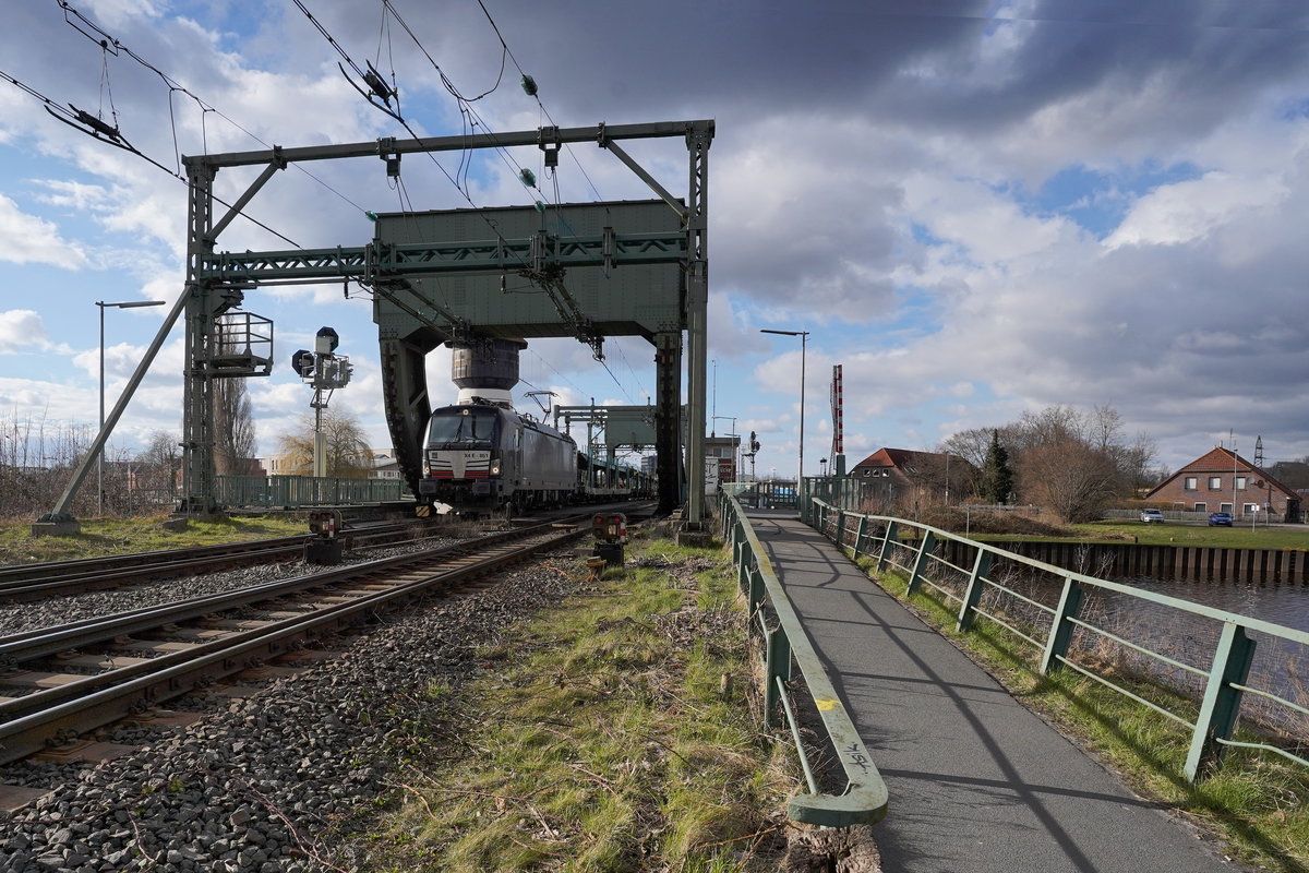 Oldenburg-Hunte-Klappbrücke MRCE-X4E-851(91 80 6193 851-3 D-DISPO)(Vectron-AC Siemens2013FNr21827) +Güterzug.

2021-03-19 351ak Oldenburg-Hunte-Klappbrücke 