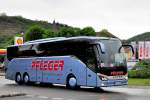 Setra 516 HD von Pfleger Reisen aus Nieder�sterreich am 17.Mai 2014 in Krems unterwegs.