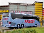 Setra 516 HD von Pfleger Reisen aus Nieder�sterreich am 17.Mai 2014 in Krems unterwegs.