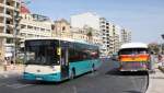 Ein KingLong Stadtbus passiert einen alten AEC Reliance Stadtbus, der am 15.5.2014 aber als solcher schon ausgedient hatte und als Verkaufswagen am F�hrhafen in Sliema in Malta genutzt wurde.