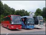 Mercedes Tourismo von Neubauer aus �sterreich und MAN Lion's Coach von H�mmer aus Deutschland und Setra 328 DT von Sch�del-Reisen (ex Eurobus ch) aus Deutschland im Stadthafen Sassnitz.