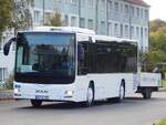 MAN Lion's City LE Ü vom Reiseienst Teske aus Deutschland mit Anhänger in Sassnitz.